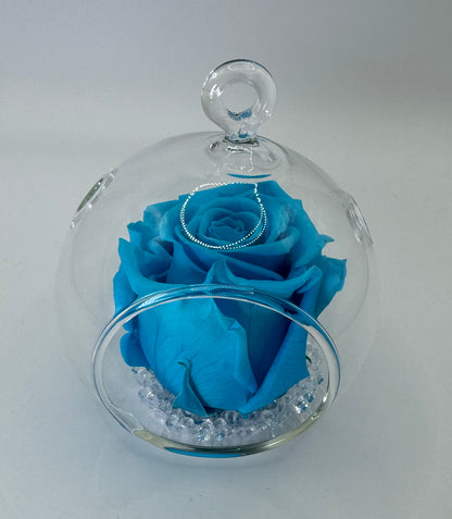 Boule en verre avec rose